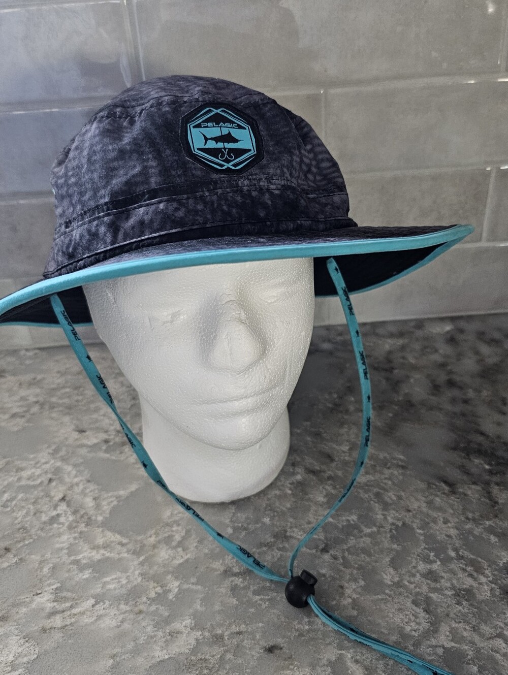 Pelagic Sunsetter Bucket Hat Fishing Sun Boonie Cap - Grey Camo Teal Accent